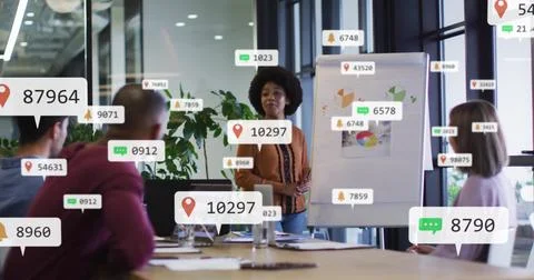 Business meeting with data points and notifications image over diverse team Stock Photos