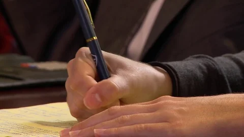 Business Meeting taking notes Stock Footage 81605956