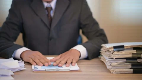 Business men check documents on the desk at the office Stock Footage 137516338