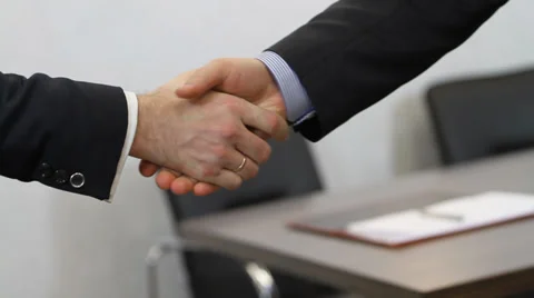Business men shaking hands after a successful transaction Video stock 34275656