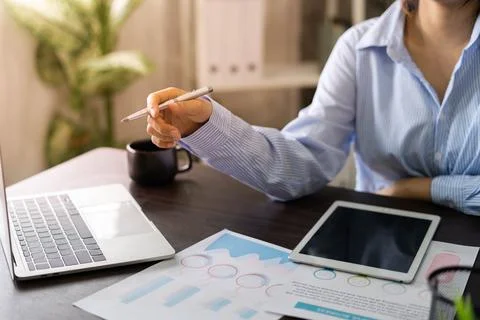 Business men work with computers to plan the production of goods. Business pe Foto stock