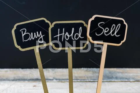 Business message Buy, Hold or Sell Stock Photos
