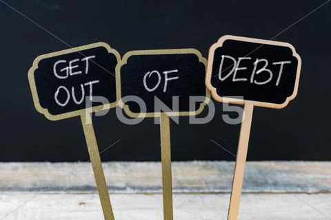 Business message GET OUT OF DEBT Stock Photos
