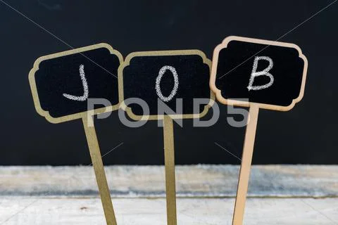 Business message JOB written with chalk Stock Photos