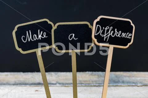 Business message MAKE A DIFFERENCE Stock Photos