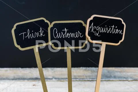 Business message THINK CUSTOMER AQUISITION Stock Photos