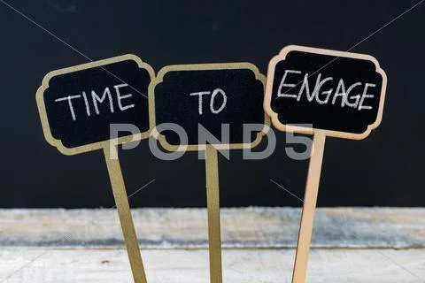 Business message TIME TO ENGAGE Stock Photos