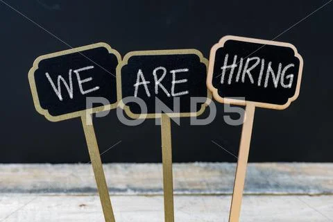 Business message WE ARE HIRING Stock Photos
