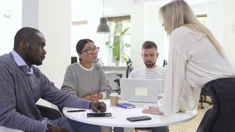 Business multi-ethnic team working together in a meeting. Stock Footage 233689385