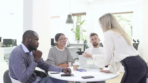 Business multi-ethnic team working together in a meeting. Stock Footage 233689644