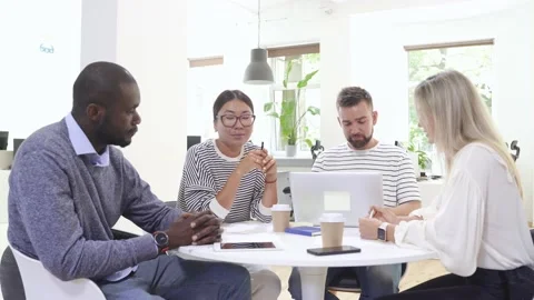 Business multi-ethnic team working together in a meeting. Stock Footage 233689907