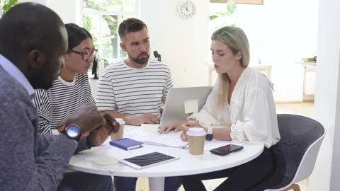 Business multi-ethnic team working together in a meeting. Video stock 233690922