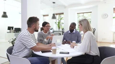 Business multi-ethnic team working together in a meeting. Video stock 233693653