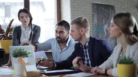 Business multicultural group having a brainstorm in the office Video stock 73128739