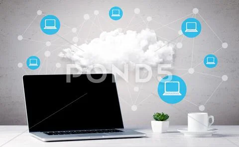 Business notebook on desk with computers Stock Photos