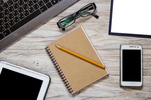 Business objects on the light wooden table top Stock Photos