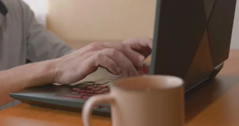 Business: Office worker typing on PC keyboard side view Stock Footage 204075581