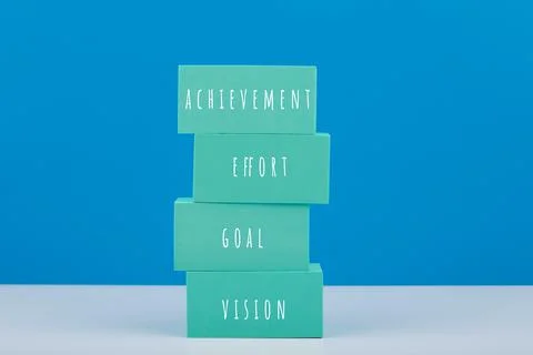 Business or personal development concept. Aqua blue rectangles with text against Stock Photos