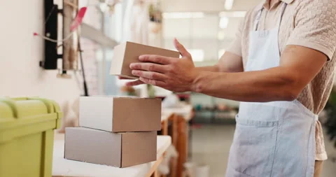 Business, package and man in studio, boxes or ecommerce with supply chain 動画素材 308731361