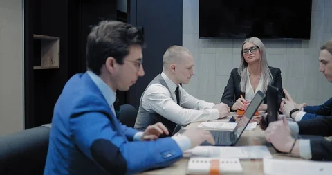 Business partner reports to the boss on the development of the company. Director Stock Footage 102482429