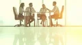 The business partners discuss at the table 4k or 4k+ Resolution