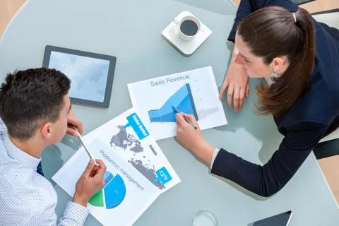 Business partners discussing work together. Stock Photos