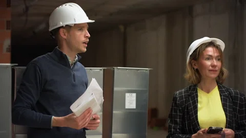 Business partners evaluating infrastructure development project. Strategic .. Stock Footage 329645278