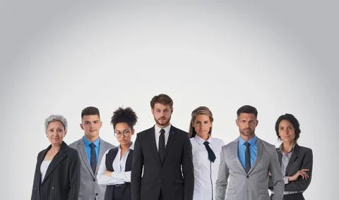 Business partners looking at camera Stock Photos