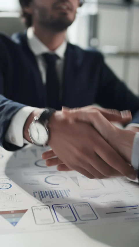 Business Partners Making Deal While Negotiating Video stock 253842862