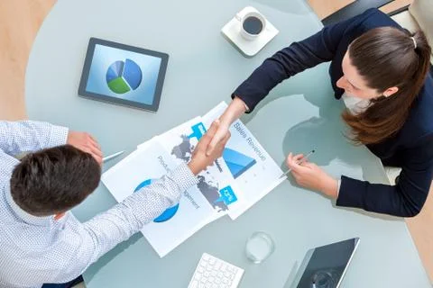 Business partners shaking hands on deal Stock Photos