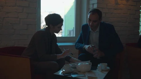 Business partners signed a contract in cafe Stock Footage 120723300