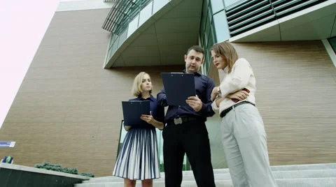Business partners talking Stock Footage 68955454