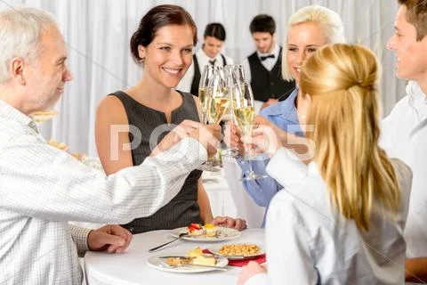 Business partners toast champagne company event Stock Photos