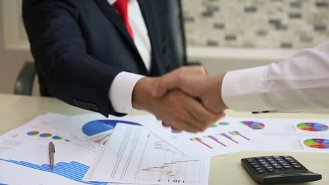 Business Partnership Concept with Financial Documents Stock Footage 346178935