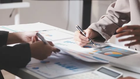 Business partnership coworkers using a tablet to analysis graph company fin.. Stock Footage 342228892