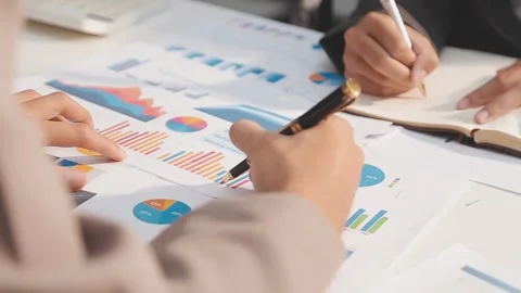 Business partnership coworkers using a tablet to analysis graph company fin.. Stock Footage 342228897