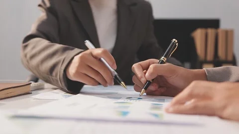 Business partnership coworkers using a tablet to analysis graph company fin.. Stock Footage 342228993