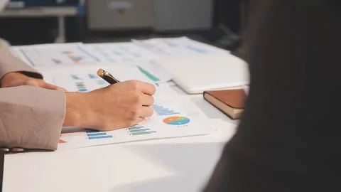 Business partnership coworkers using a tablet to analysis graph company fin.. Stock Footage 342229005
