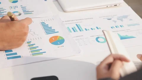 Business partnership coworkers using a tablet to analysis graph company fin.. Stock Footage 342229006