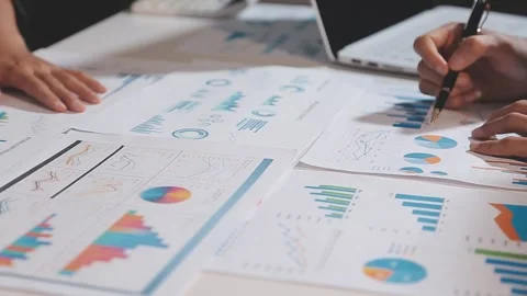 Business partnership coworkers using a tablet to analysis graph company fin.. Stock Footage 342229054