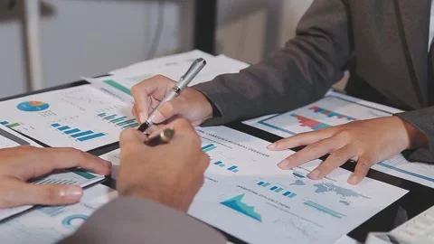 Business partnership coworkers using a tablet to analysis graph company fin.. Stock Footage 342229101