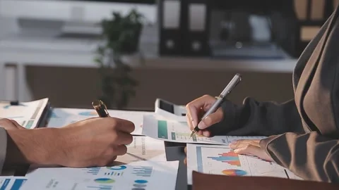 Business partnership coworkers using a tablet to analysis graph company fin.. Stock Footage 342229136