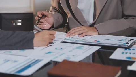 Business partnership coworkers using a tablet to analysis graph company fin.. Stock Footage 342229211