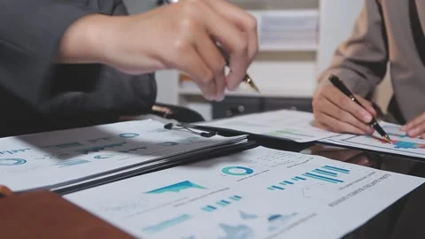 Business partnership coworkers using a tablet to analysis graph company fin.. Stock Footage 342229228