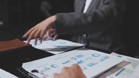 Business partnership coworkers using a tablet to analysis graph company fin.. Stock Footage 342229252