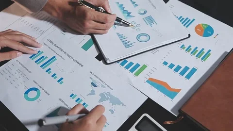 Business partnership coworkers using a tablet to analysis graph company fin.. Stock Footage 342229313