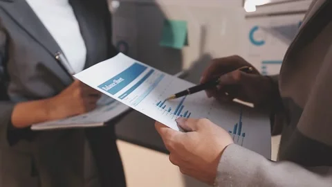 Business partnership coworkers using a tablet to analysis graph company fin.. Stock Footage 342229330