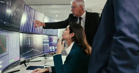 Business, people and computer by talking for stock market, trading plan and Stockbeeldmateriaal 283590775