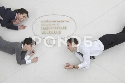 Business people and speech bubble, elevated view Stock Photos