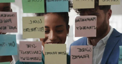 Business, people and sticky notes on glass in office for training, planning and Stock Footage 336594674
